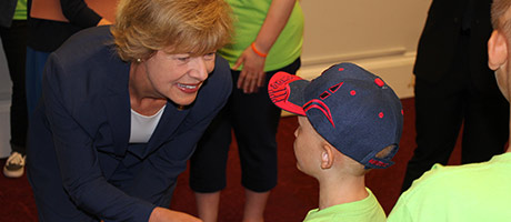 Senator Baldwin meeting a young NFED member