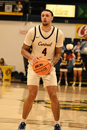 Jacobi gets ready to shoot a free throw on the basketball court.