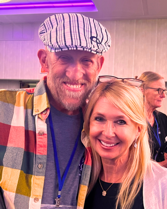 Two board members smiling for 2024 NFEDImpact Report