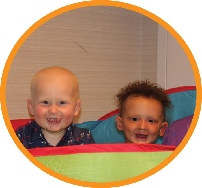 Picture of two cute kids  with smiles 2024 NFEDImpact Report