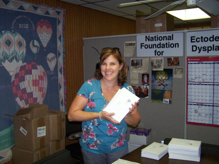 Kristin working at the NFED office as a volunteer.