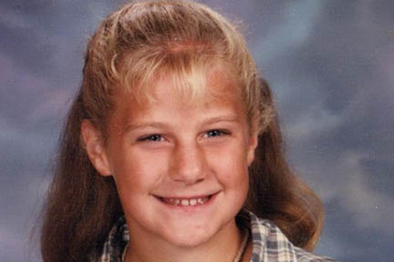 Lindsey's headshot when she was a youth.