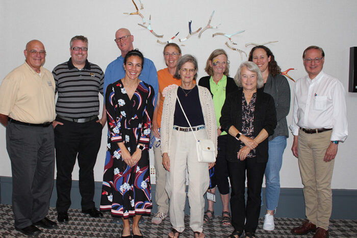 Ten member of the Scientific Advisory Council stand in two rows.